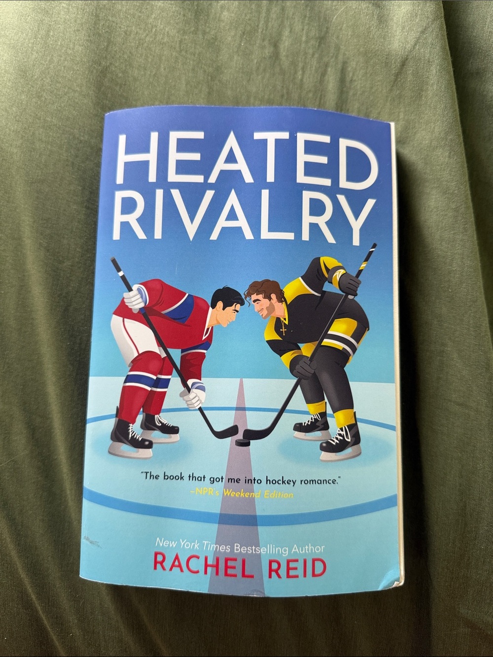 Heated Rivalry by Rachel Reid - Blue Cover Hockey Romance
